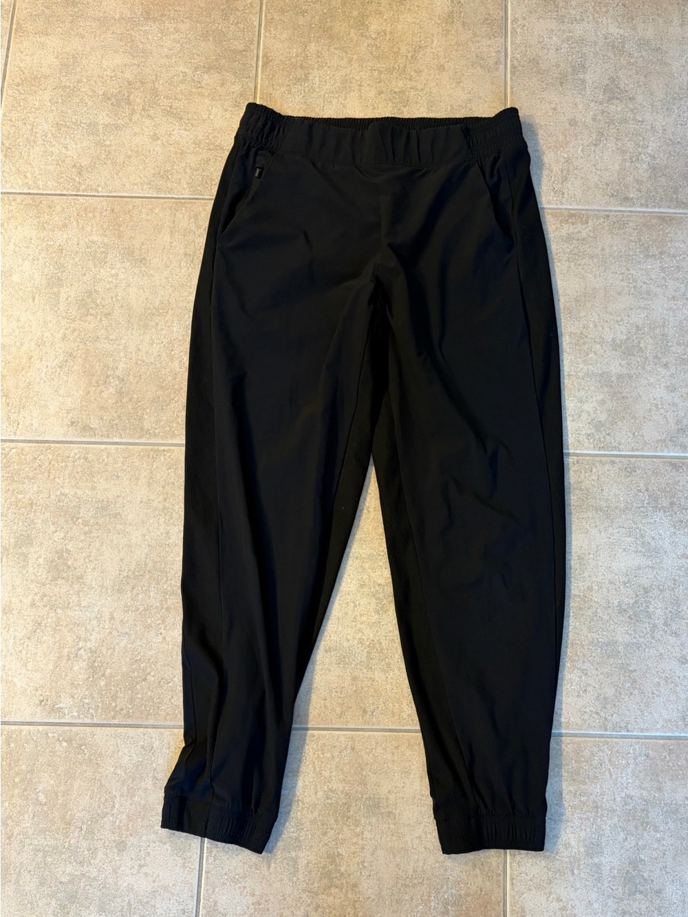 Women’s black Athleta Brooklyn jogger.